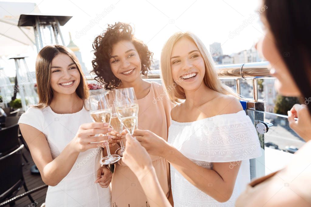 Happy young women having a hen party