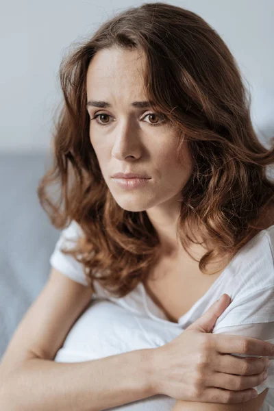 Portrait of an unhappy nice woman thinking about her problems — Stock Photo, Image
