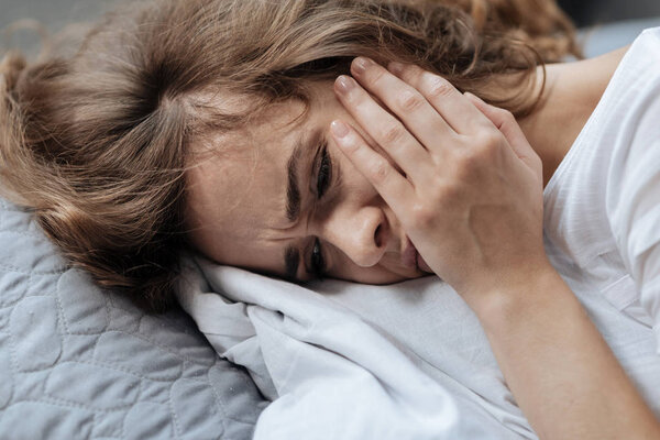 Sad young woman feeling depressed