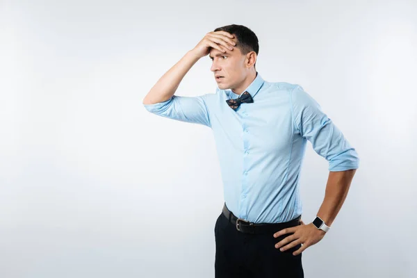 Serious handsome man having problems — Stock Photo, Image