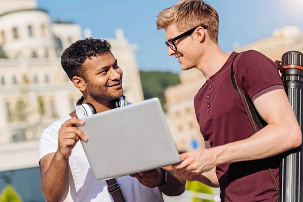 stock image Friendly conversation between two group mates