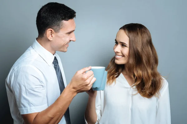 Joyful delighted people looking at each other — Stock Photo, Image