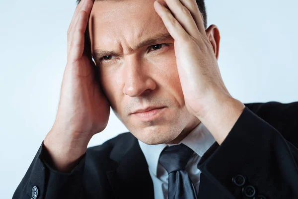 Portrait of a stressed cheerless man — Stock Photo, Image