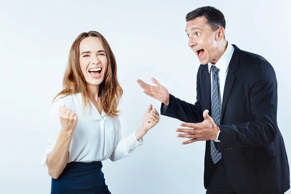 Very emotional coworkers getting excited together — Stock Photo, Image