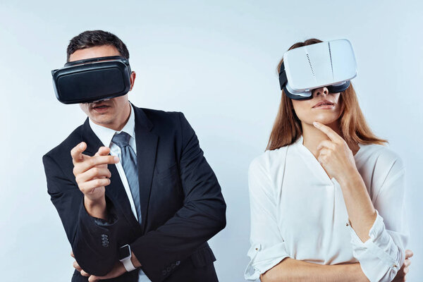 Pensive colleagues considering over something