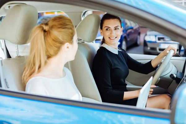 Joyful delighted woman wearing a seat belt — Stock Photo, Image