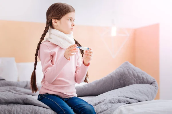 Sick girl thinking about staying at home — Stock Photo, Image
