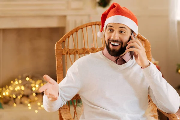 Lively man being surprised while talking on the phone — Stock Photo, Image