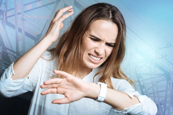 Cheerless nice woman looking at the time — Stock Photo, Image