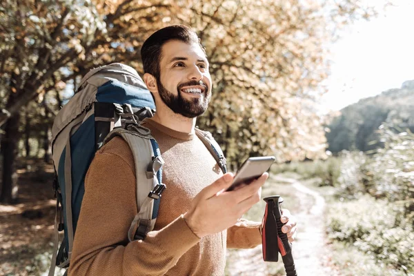 Handsome man having a walk outdoors — Stock Photo, Image