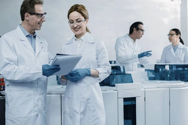 Joyful smart scientist working together — Stock Photo, Image