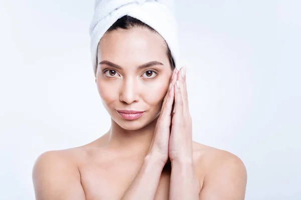 Beautiful woman in towel turban folding hands — Stock Photo, Image