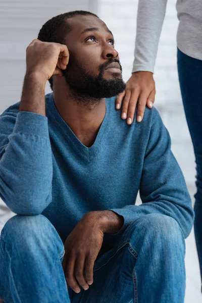 Unhappy man looking sad and thoughtful — Stock Photo, Image