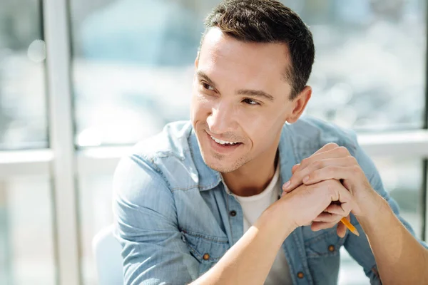 Positive delighted man turning head — Stock Photo, Image