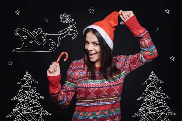 Vrolijke jonge vrouw vieren Kerstmis — Stockfoto
