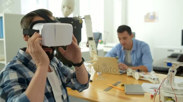 Close up of excited engineer wearing virtual glasses — Stock Video