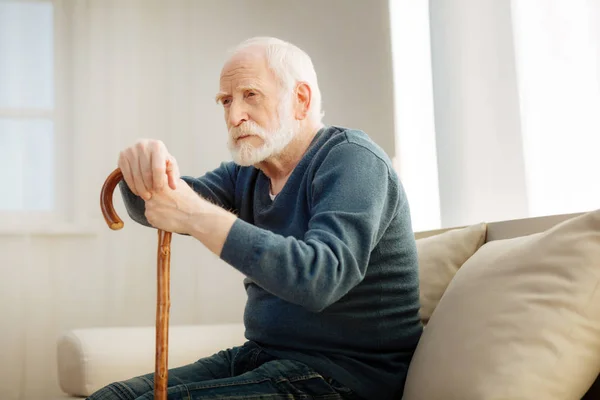 Serious mature male being deep in thoughts — Stock Photo, Image