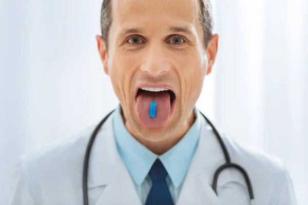 Joyful medical worker making funny faces — Stock Photo, Image