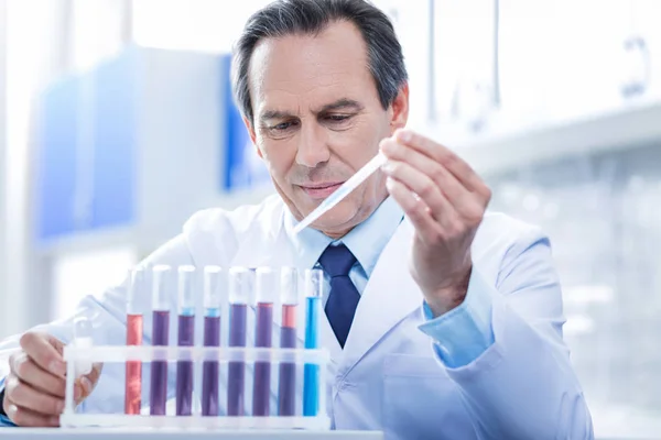 Serious professional biologist working with samples — Stock Photo, Image