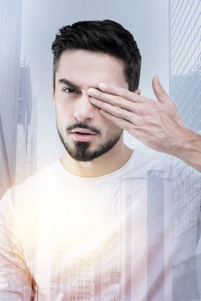 Serious brunette model posing on camera — Stock Photo, Image