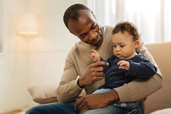 Alert man playing with his child — Stock Photo, Image