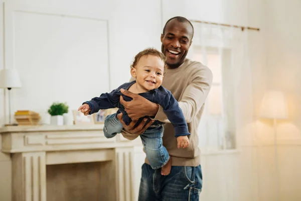 Happy father playing with his young son — Stock Photo, Image