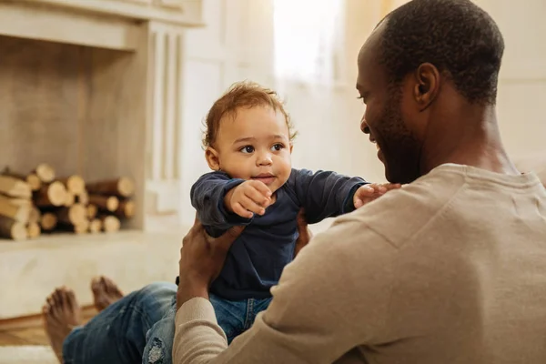 Alert father playing with his young son — Stock Photo, Image
