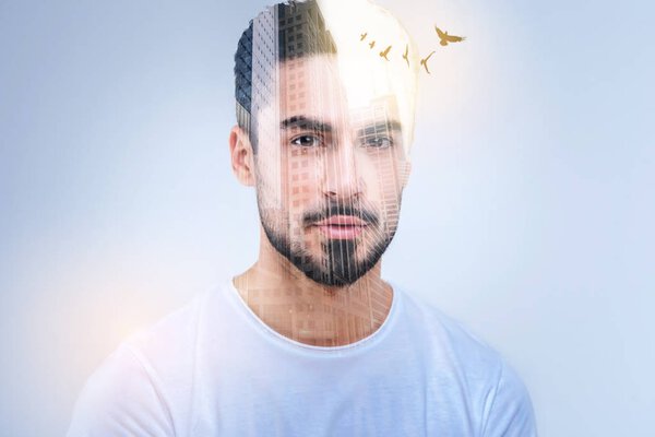 Handsome bearded man imagining high building