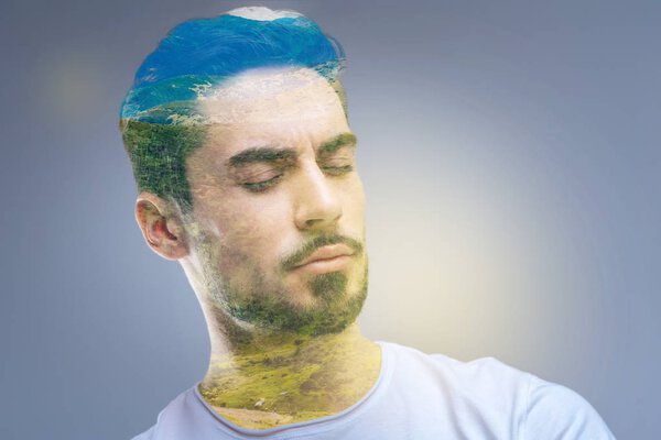 Calm handsome man feeling peaceful