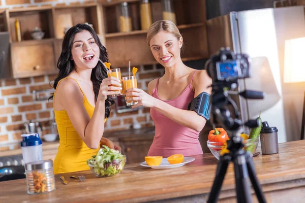 Beautiful well built women looking into the camera — Stock Photo, Image