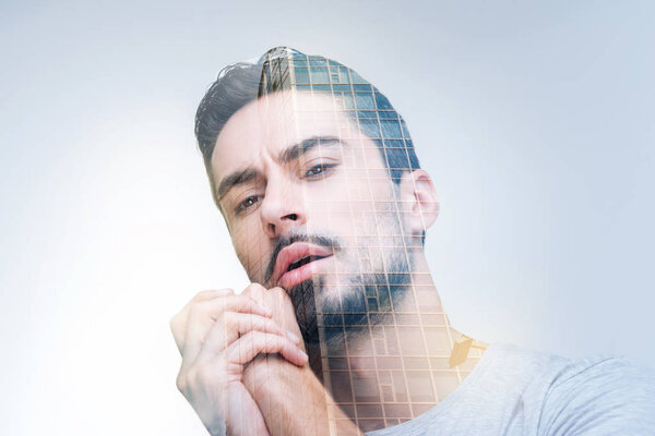 Concerned doubtful man observing situation