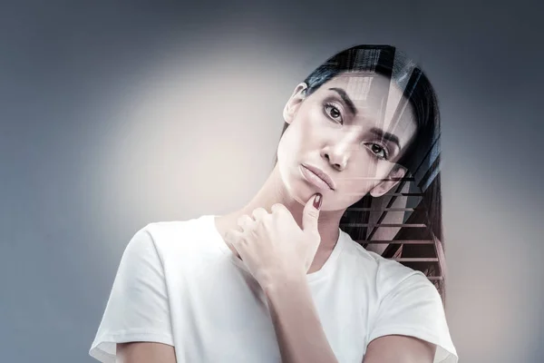 Confident young woman being deep in thoughts — Stock Photo, Image