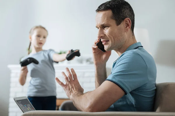 Busy dad having no time on playing with daughter — Stock Photo, Image