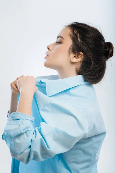 Thoughtful strong woman getting dressed — Stock Photo, Image