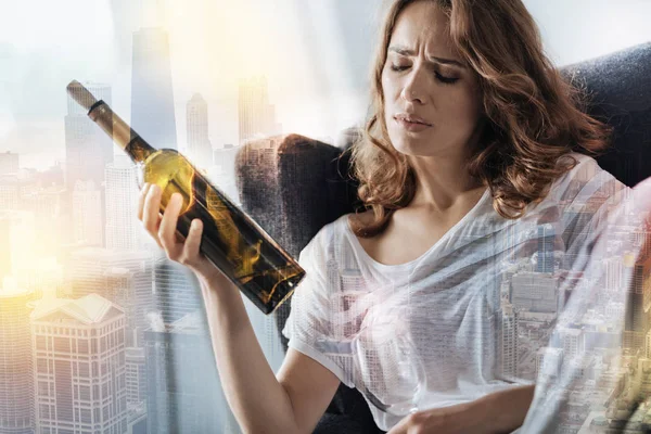 Gloomy woman having alcohol addiction — Stock Photo, Image