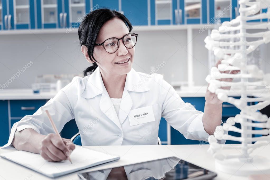 Enthusiastic female scientist conducting genetic research