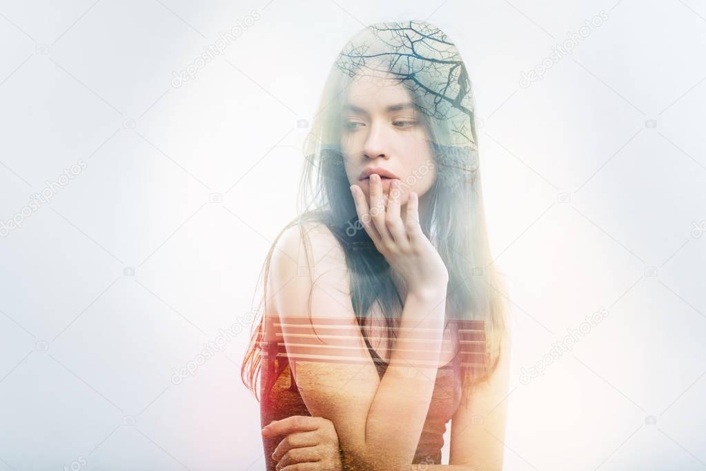 Young woman touching her lips and regretting mistakes