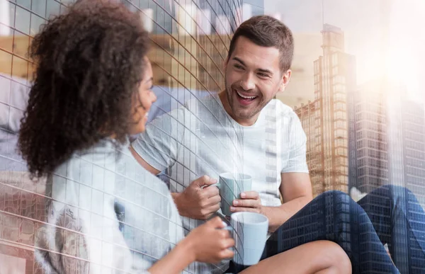 Delighted happy couple having tea — Stock Photo, Image