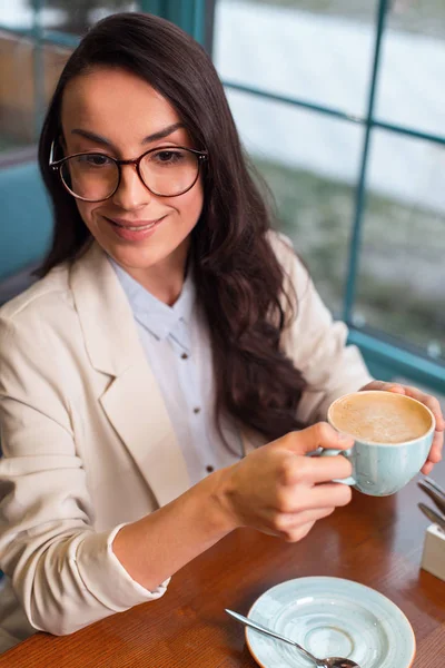 Appealing pleased woman enjoying coffee — Stock Photo, Image