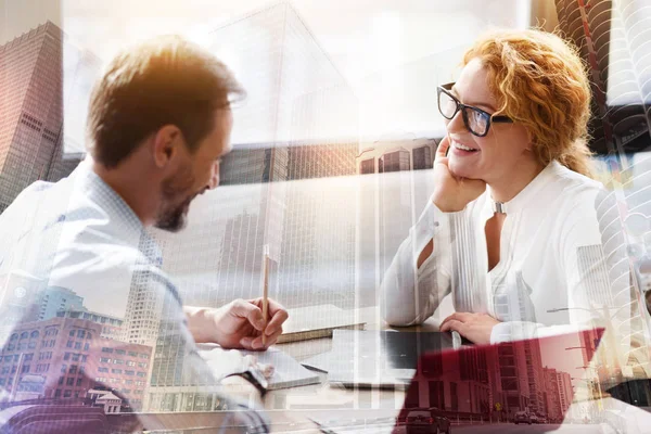 Two cheerful colleagues chit-chatting during small break — Stock Photo, Image