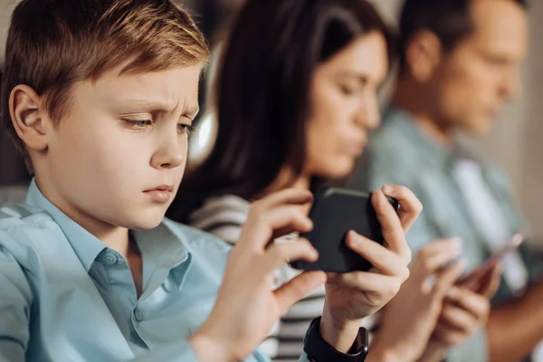 Close up of little boy disappointed about the game — Stock Photo, Image