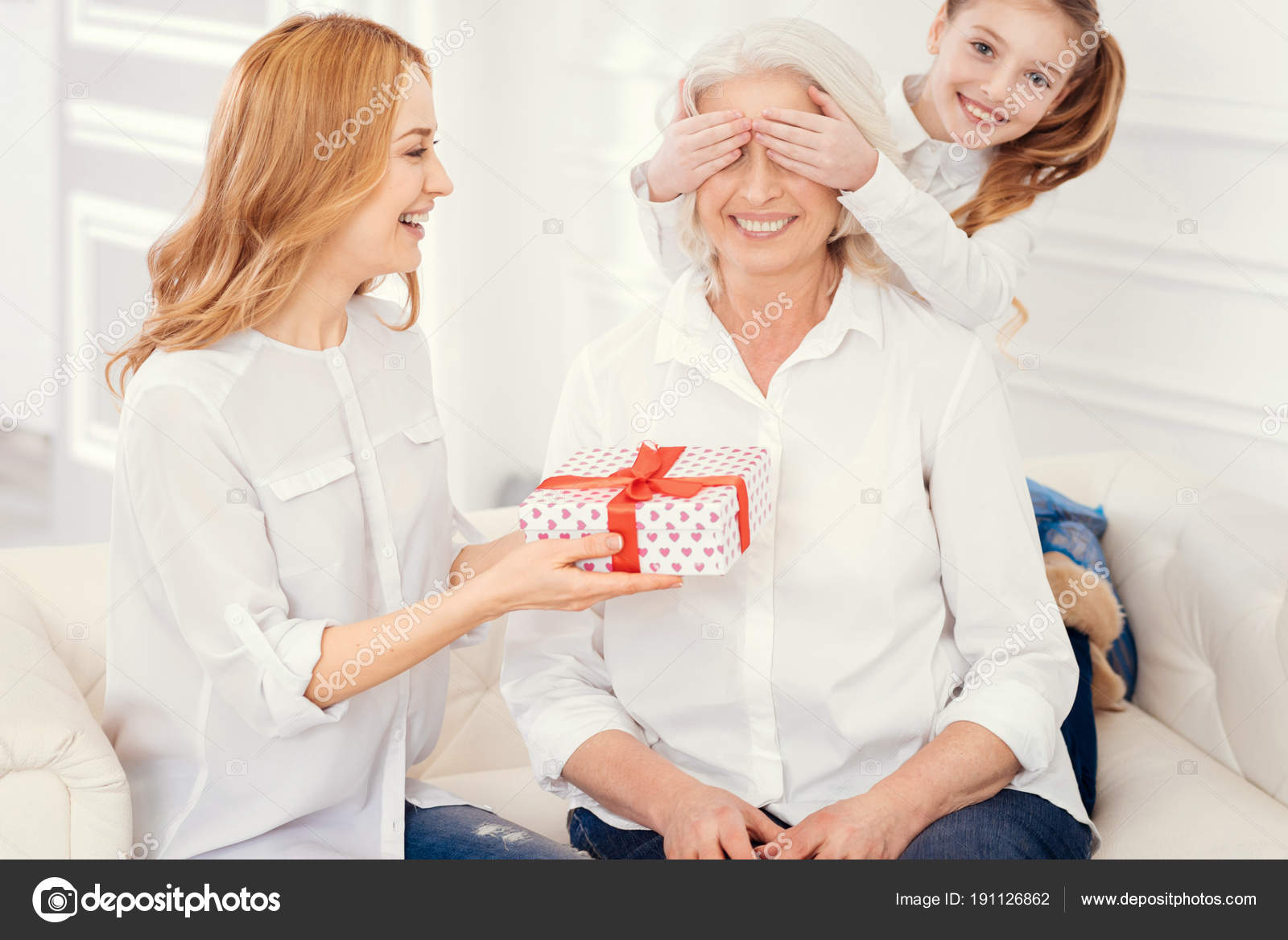 Grandmother making love Loving Grandchild And Mom Making Surprise Gift For Grandmother Stock Photo By C Dmyrto Z 191126862