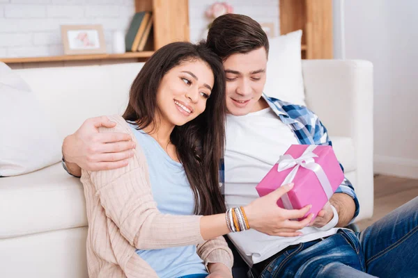 Handsome man passing present to woman — Stock Photo, Image