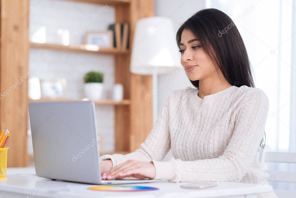 Gay female freelancer working at home