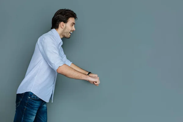 Positive excited man looking in front of him — Stock Photo, Image