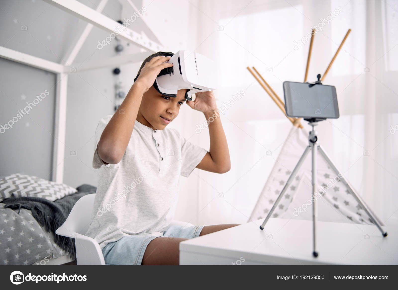 Gay Boy Blogger Putting On Vr Glasses Stock Photo