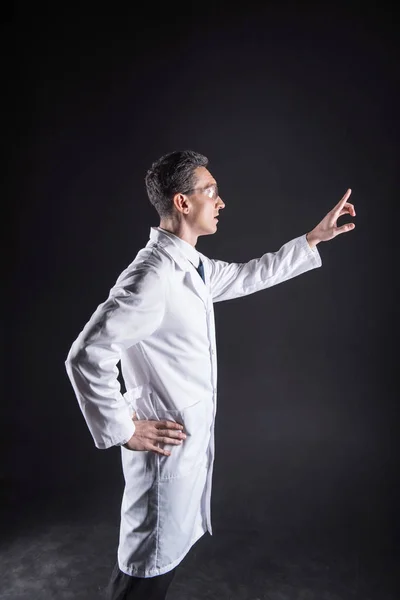 Smart male scientist doing a research — Stock Photo, Image