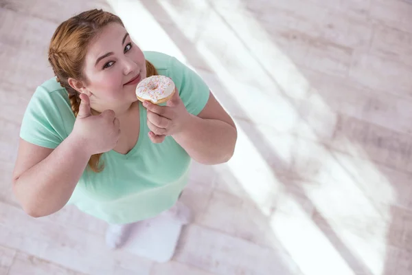 Stubborn plump woman refusing from unhealthy food — Stock Photo, Image