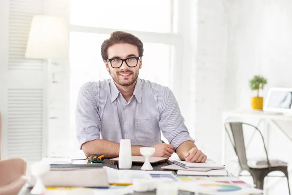 Inspired manager sitting in his office — Stock Photo, Image