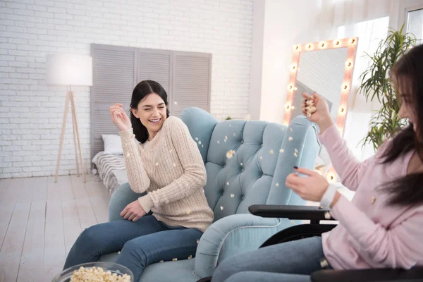 Stop Energetic Immobile Women Throwing Popcorn Laughing — Stock Photo, Image